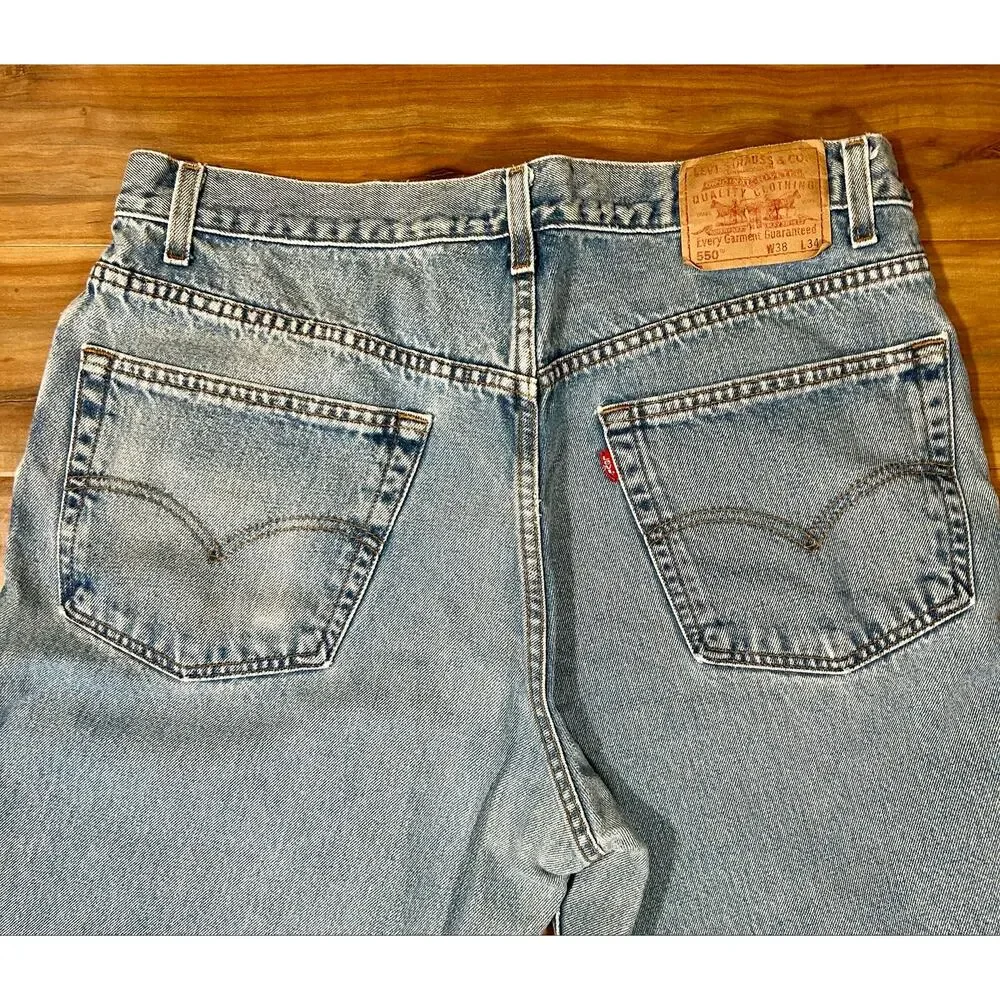 Vintage 90s Levi’s 550 Relaxed Fit Tapered Leg Jeans 38x34 Light Wash Distressed